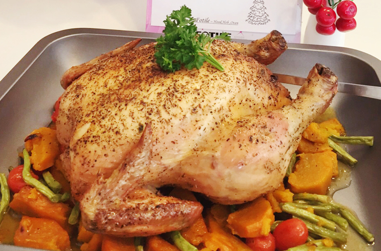 Roasted Chicken stuffed with Chestnut and mushroom, served with onion gravy